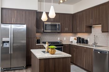 Island kitchen in select floor plans*